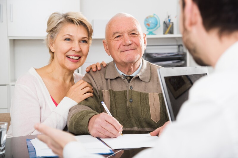Old man and woman in social department